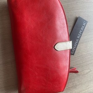 Never been used red B. R. clutch